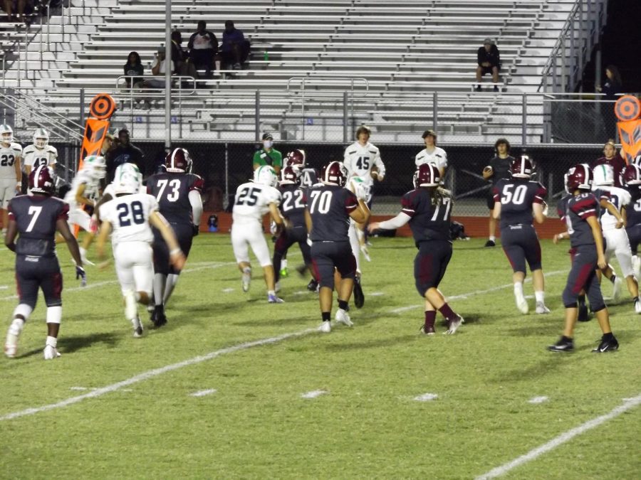 Sun Valley offence pushing past Weddington defensive  line. 